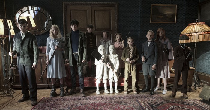 DF-12584 - The residents of MISS PEREGRINE’S HOME FOR PECULIAR CHILDREN ready themselves for an epic battle against powerful and dark forces. Left to right: Enoch (Finlay Macmillan), Emma (Ella Purnell), Jake (Asa Butterfield), Hugh (Milo Parker), Bronwyn (Pixie Davies), the twins (Thomas and Joseph Odwell), Claire (Raffiella Chapman), Fiona (Georgia Pemberton), Horace (Hayden Keeler-Stone), Olive (Lauren McCrostie), and Millard (Cameron King). Photo Credit: Jay Maidment.